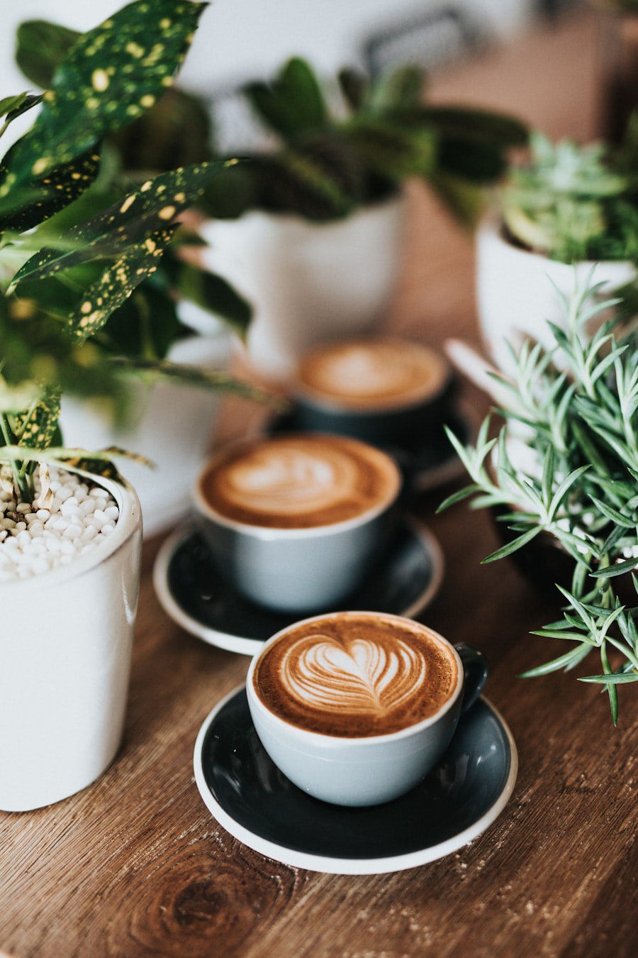 Latte with heart-shaped latte art in a white ceramic cup